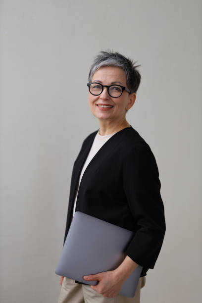 istock A successful manager and entrepreneur, exuding confidence and happiness, stands as a model of leadership. 2149247603