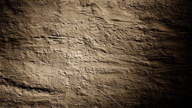 istock A muddy background with a spotlight shining in the center with a brown-black gradient. For backdrops, banners, frames, posters, scenes. 2149248273