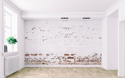 Empty retro style room/space with a ruined white brick wall background with copy space on the hardwood parquet floor, built-in ceiling reflectors, moldings, retro radiator-heater under a large retro window with decoration (books, potted plant spathifilium) on a side. 3D rendered image. 3D rendered image.