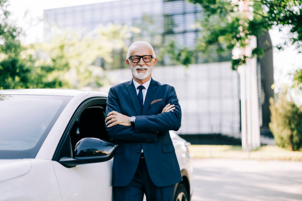 istock Professional driver is standing next to the car 2149249867