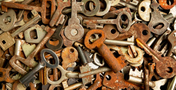 istock Many old metal padlock keys, abstract background 2149250438