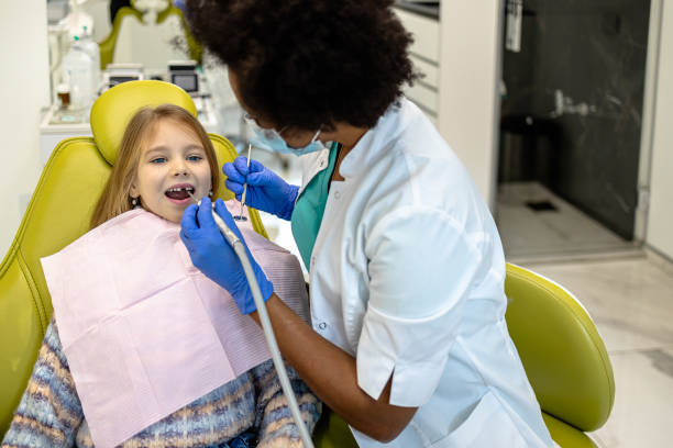 istock Child's dental health focus in small office 2149251775