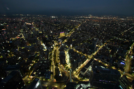 view of the city of Santiago de Chile at night from the tallest building in the city