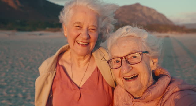 Selfie, beach and elderly women friends on a retirement vacation, adventure or holiday together. Smile, travel and senior female people with funny face photography by ocean or sea on weekend trip.