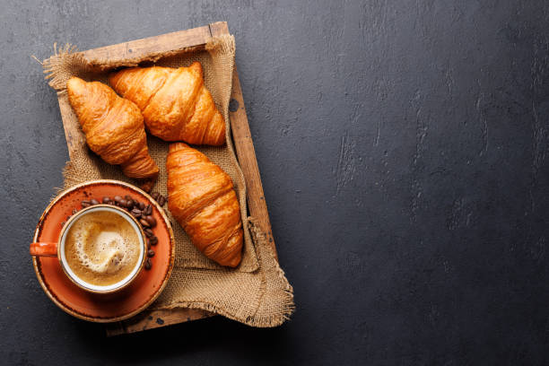 istock Cappuccino coffee and fresh croissants 2149258281