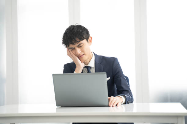 istock Male businessman having trouble when creating documents on his laptop. 2149259738