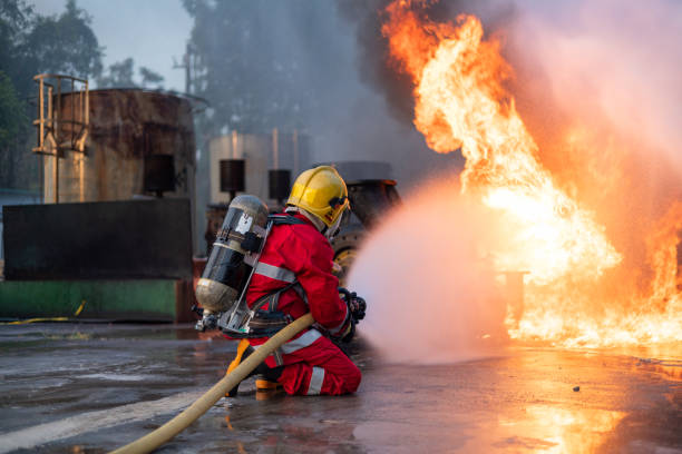 istock Firefighters Extinguishing Blaze in Industrial Area 2149259815