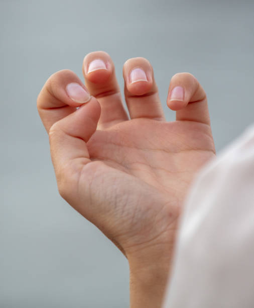 istock Transparent manicure on a girl's hands 2149260561