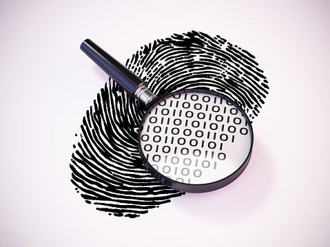 A close-up view showing a magnifying glass with a black handle placed upon a detailed black ink fingerprint pattern, carefully displayed against a plain white backdrop. There is a sample of binary data on the glass. The illustration suggests forensic analysis or the concept of identity verification.