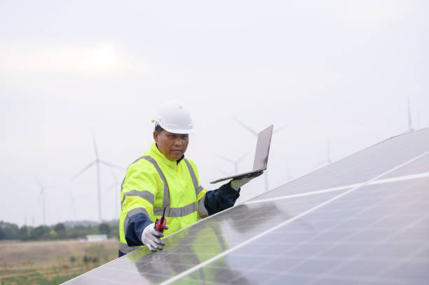 istock Business man or owner check job progress of solar panel installation , sustainable and renewable energy , business discussion 2149263066