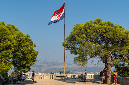 Flags of the Ligoure Region, Italy, England, and the European Union flying over Santa Margherita Ligure, Italy