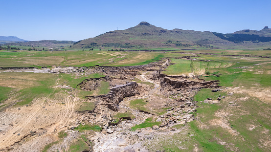 Erosion canyon forming drone shot from the air in rural Lesotho Highlands