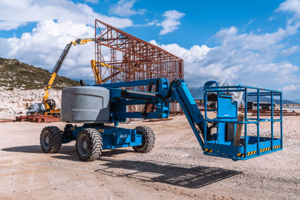 istock Lifting crane tractor on industrial construction site. Heavy duty machinery for building industry 2149263928