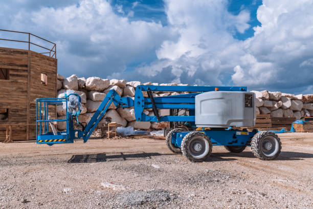 istock Lifting crane tractor on industrial construction site. Heavy duty machinery for building industry 2149264086