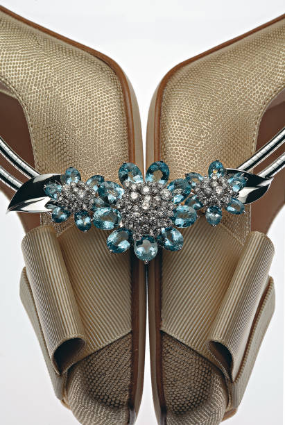 Moscow, Russia- February 15, 2006 : Diamond necklace on the women's shoes. Selective focus