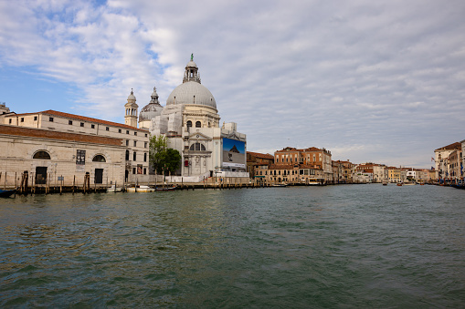 View of the Grand Canal in Venice, the main thoroughfare which is lined by old mansions and churches.