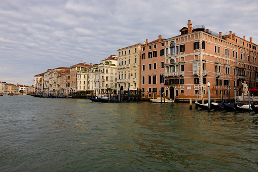 View of the Grand Canal in Venice, the main thoroughfare which is lined by old mansions and churches.