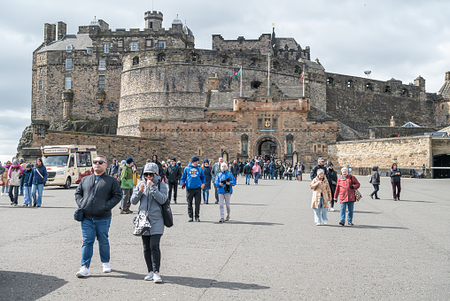 Tourists on the Esplanade in front of Edinburgh Castle, Edinburgh, Scotland