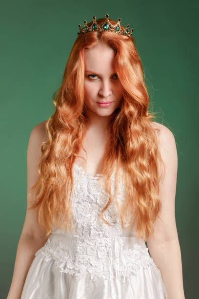 istock Living warlike red-haired chess queen White. 2149270897