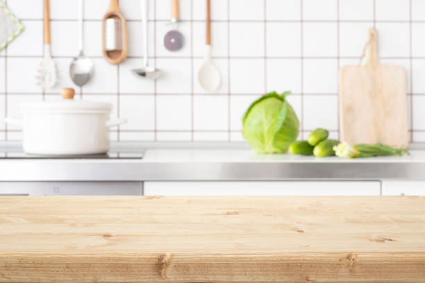 istock Grain texture wooden table top on blurred kitchen for product display montage 2149271250