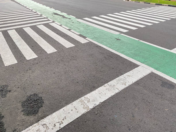 istock white stripes on black asphalt, road markings zebra crossing, 2149273690