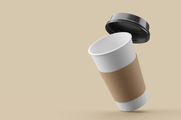 istock Paper coffee cup with black lid on sorft pink background mockup 3d rendering 2149275793