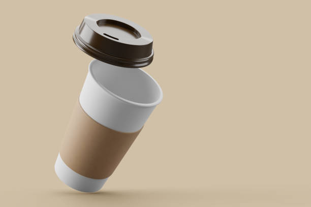 istock Paper coffee cup with black lid on sorft pink background mockup 3d rendering 2149275823
