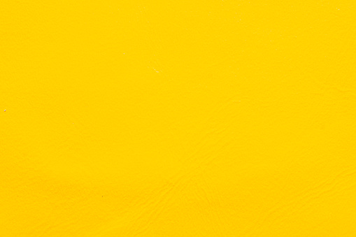 Bright Yellow Textured Paper Background