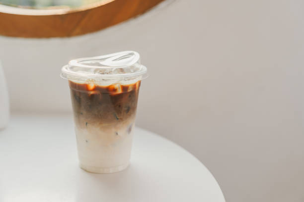 istock Iced latte coffee, placed on a table in a cafe. 2149277086