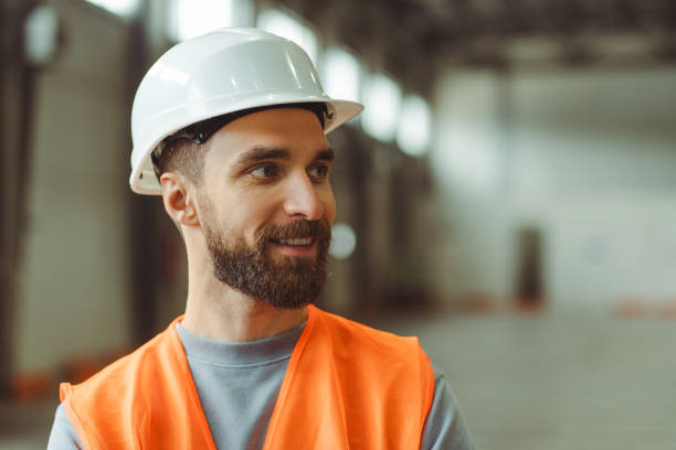 istock Handsome bearded Caucasian man, professional foreman, architect wearing hard hat and workwear 2149277430