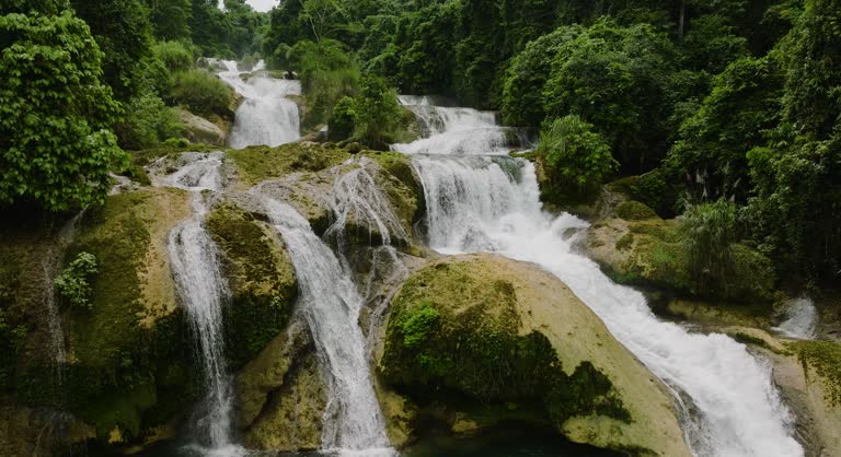 Mountain with Tropical Waterfalls. Aliwagwag Falls in the Philippines.