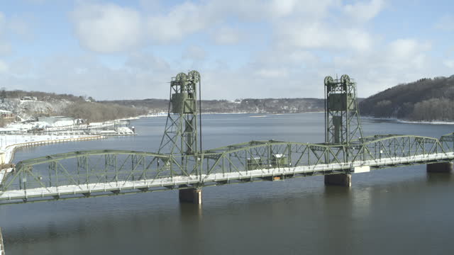 Aerial establishing Stillwater Lift Bridge over Saint Croix River in Minnesota