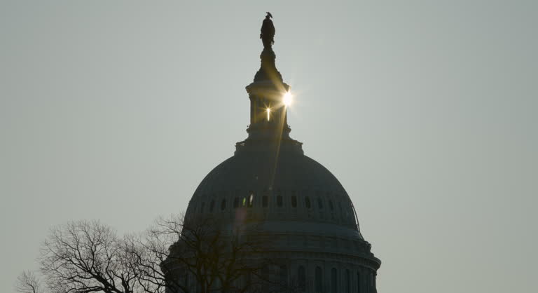 Sun Passing Between Columns Atop U.S. Capitol Dome