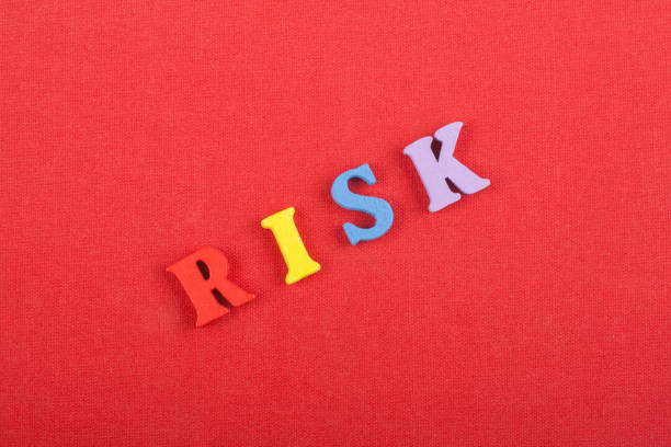 istock RISK word on red background composed from colorful abc alphabet block wooden letters, copy space for ad text. Learning english concept. 2149284794