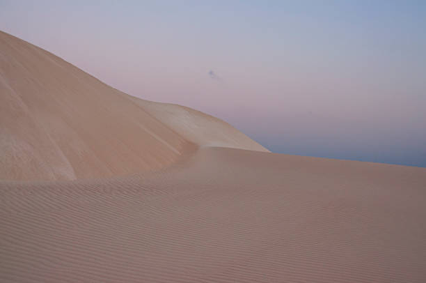 istock calm desert landscape. dunes in the gentle evening light. sand texture 2149285220