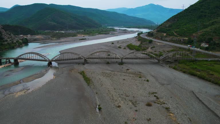 Historic Bridge of Mat in Albania from the Past Century: Arching Concrete and Iron Over the River Flowing from the Mountains