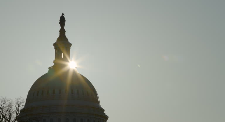 Sunburst Appearing Over U.S. Capitol Building Dome