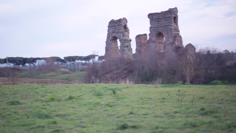 Ancient ruins of the Roman aqueducts in what is now a public park, pan shot