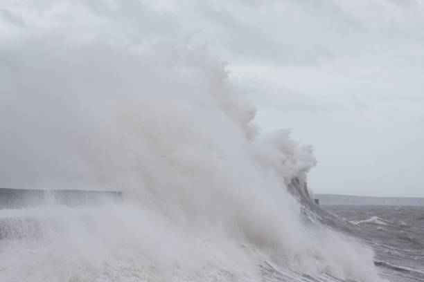 Porthcawl, South Wales, UK.  6 April '24.  UK weather: Enormous waves along the coast this afternoon, caused by Storm Kathleen
