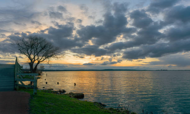 istock Reflection of majestic blue cloudscape on jake 2149299810