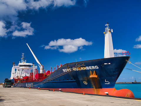 Bridgetown, Barbados - Jan 28 2024: The Scot Nuernberg, a Chemical and Oil Products Tanker, moored at the Port of Bridgetown, Barbados in the Caribbean. Taken on a sunny day with light clouds.