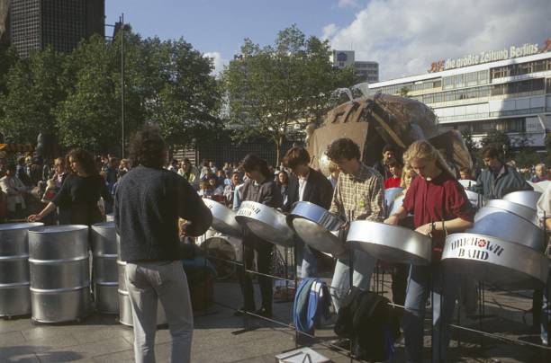 Berlin (West), Germany, 1987. 750th anniversary of Berlin. Steel drum band and spectators on Berlin's Breitscheidplatz in City West.