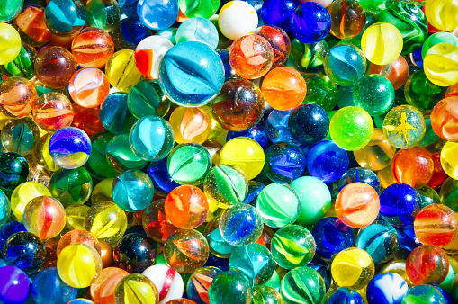 A collection of colorful old glass marbles at a Cape Cod Flea Market.