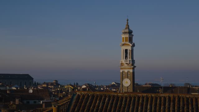 High Bell Tower Of Church Of The Holy Apostles Of Christ In Venice