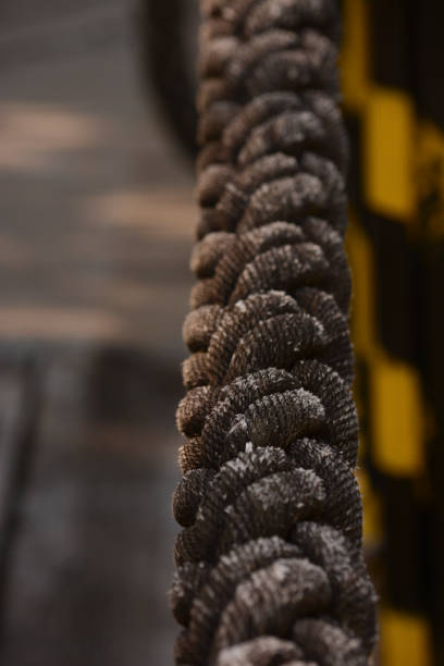 istock boat rope, support that holds a boat to the dock, thick rope 2149310227