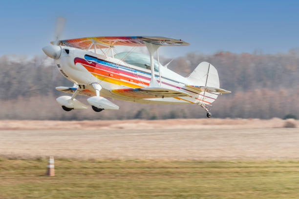 A beautifully maintained Aviat Eagle II biplane flies by at Massey Aerodrome, a small grass field on Maryland’s Eastern Shore.\n\nThe Aviat Eagle II is a high-performance, two-seat aerobatic biplane designed and manufactured by Aviat Aircraft Inc. The Eagle II is renowned for its exceptional agility, robust construction, and outstanding aerobatic capabilities, making it a popular choice among aerobatics enthusiasts and professional pilots alike.