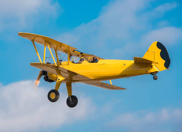A beautifully restored Steersman PT-17 flies by at Massey Aerodrome, a small grass field on Maryland’s Eastern Shore.\n\nThe Stearman PT-17, also known simply as the Stearman or the Boeing Stearman, is a biplane trainer aircraft that played a significant role in military pilot training during World War II. Developed by the Stearman Aircraft Company in 1934, later acquired by Boeing, the PT-17 became one of the most iconic and widely used primary trainers of its time.