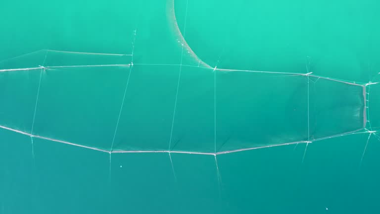 Net Fishing in the Aegean Sea: Aerial View of a Traditional Trap in Thessaloniki's Greece's Deep Blue Waters.