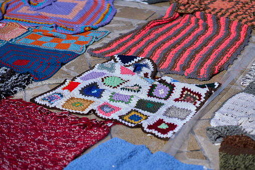 blankets showcased at a craft event