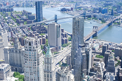 Elevated view of New York City. Downtown. View of Manhattan bridge and Brooklyn bridge. Helicopter view.